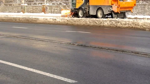 Snowplow cleans the pavement Stock Footage 170558283