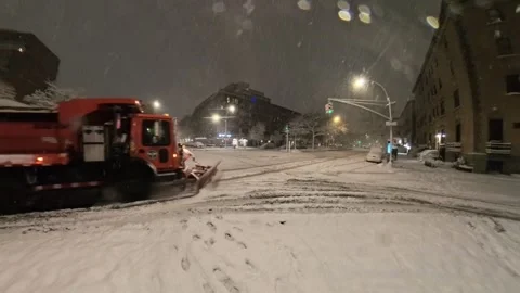 Snowplow Clearing Snow at Manhattan Intersection During Night Snowfall Video stock 330214900