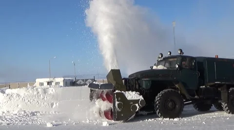 A snowplow clears the airfield Stock Footage 68567832