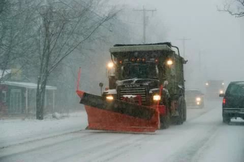 Snowplow  in developing New England snowstorm Stock Photos