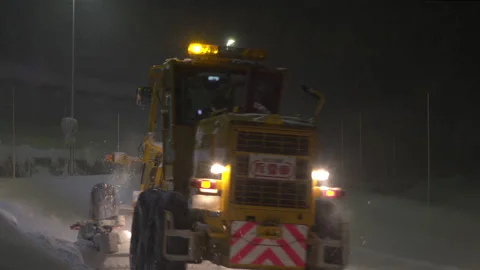 Snowplows have been out clearing the roads. Move from front to back. Stock Footage 168446348
