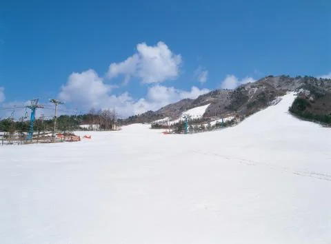 Snows by mountain Stock Photos