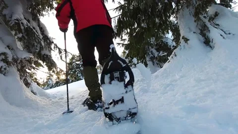 Snowshoeing in deep snow Stock Footage