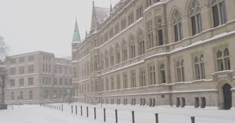 Snowstorm blizzard and white winter street scenery in German city Brunswick Stock Footage 148980150