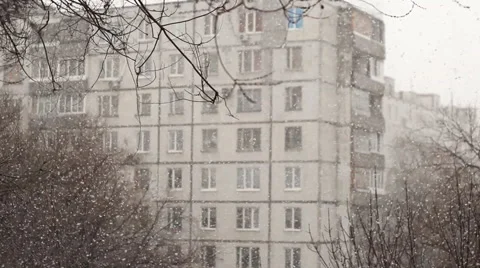 Snowstorm On Blurred Background Of The House Video stock 49304515