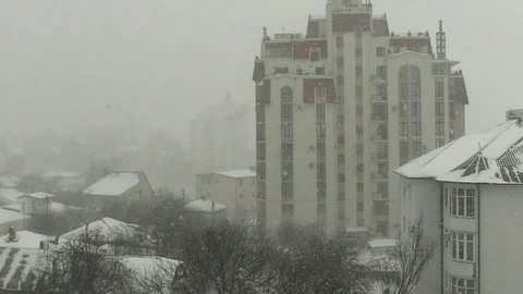 Snowstorm on a city backgrounds Stock Footage 73153012