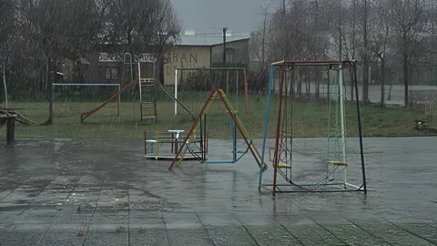 Snowstorm Falling Over an Empty Children’s Playground Stock Footage 327214577