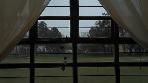 Snowstorm Seen Through a Window Indoors Stock Footage 327214427
