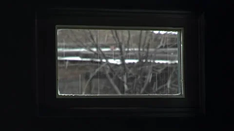 Snowstorm Seen Through a Window Indoors Stock Footage 327303025