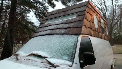 Snowstorm on tiny house van conversion in East Texas Stock Footage 146756947