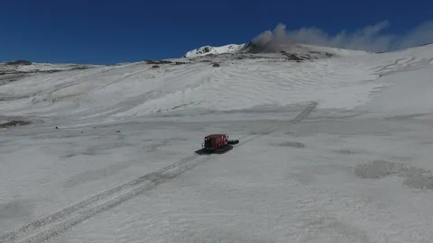 Snowtrack climbing the volcano Stock-Footage 314513432