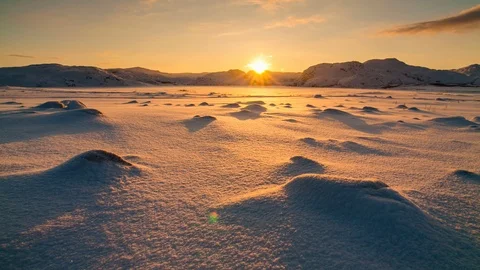 Snowy Arctic tundra at sunset. Stock Footage