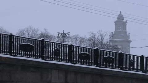 Snowy bridge, ancient tower on background Stock Footage