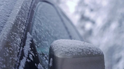 Snowy car side window rack focus shot Stock Footage 102956271