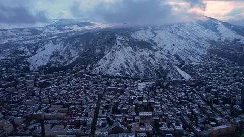 Snowy city at the sunset Stock Footage 226205705