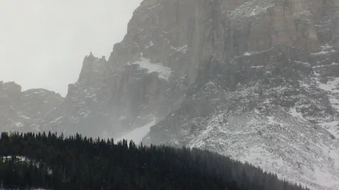 Snowy Cliffs above Pine Forest in Banff National Park Stock Footage 93803296