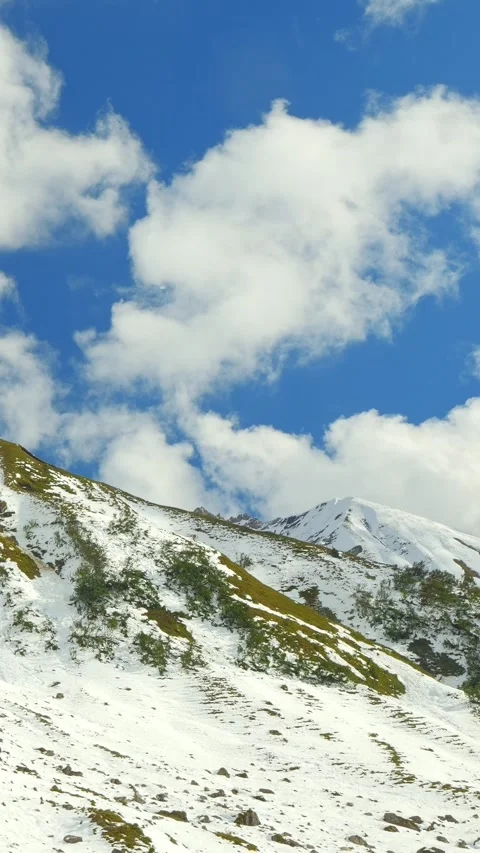 Snowy Cliffs and Alpine Calmness with Sunlight in the Bavarian Alps near Allg Video stock 308878760