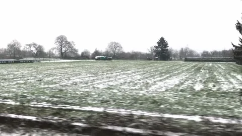 Snowy Countryside Landscape with Train Window View Stock Footage 336800356