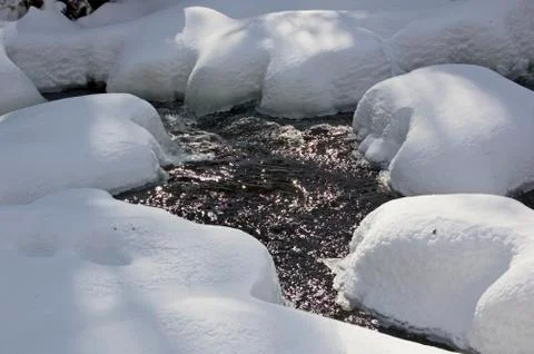 Snowy creek Stock Photos