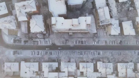 Snowy day over blocks, streets and parking lot in Bucharest Stock-Footage 262574176