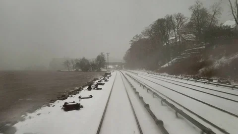 Snowy day view from a train POV Stock Footage 98800436