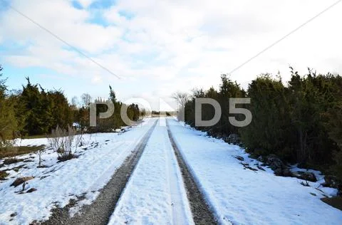 Snowy dirt road Stock Photos