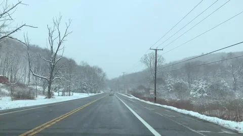 Snowy Drive Through Garrison, New York on Route 9 Stock Footage 270193267