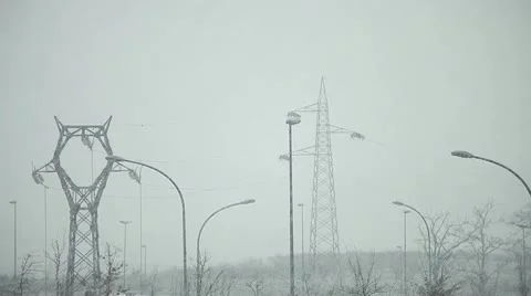 Snowy electrical tower Stock Footage 10736688