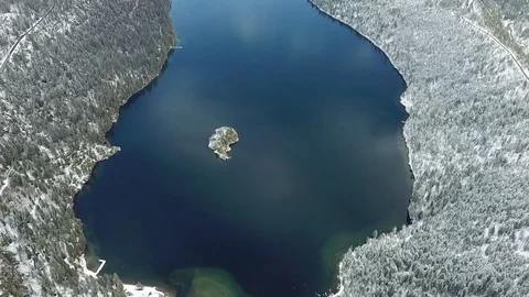 Snowy emerald bay rotation Stock Footage 83229640