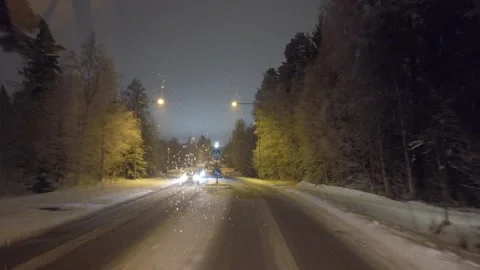 Snowy evening ride Stock Footage 168145659