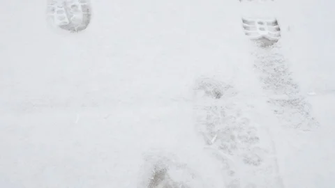 Snowy footprints close up Video stock 103295349