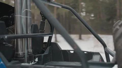 Snowy forest ATV with headlights. Offroad ATV in snow with detailed features Stock Footage 332172463