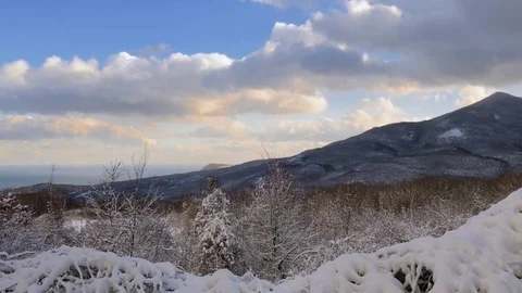 Snowy forest in mountains at sunset, time lapse Stock Footage 70282520