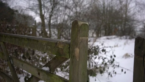 Snowy gate being closed in the British countryside, 4k, UK Stock Footage 86608107