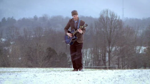 Snowy Guitar Guy 4 Stock Footage 595912