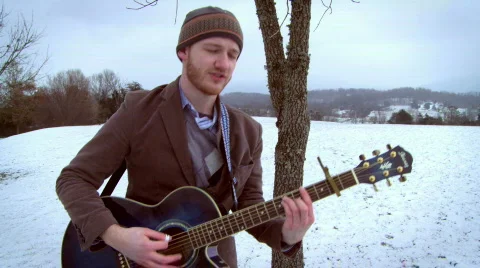 Snowy Guitar Guy 6 Stock Footage 595964