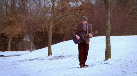 Snowy Guitar Guy 7 Stock Footage 595966