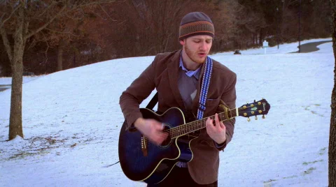 Snowy Guitar Guy 8 Stock Footage 595974