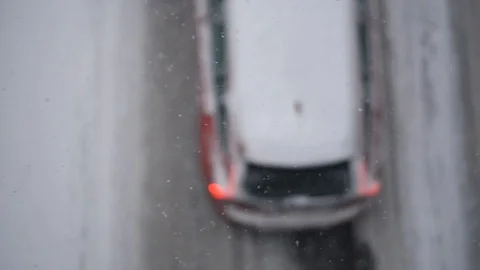 Snowy highway traffic topdown view Stock Footage 100598779