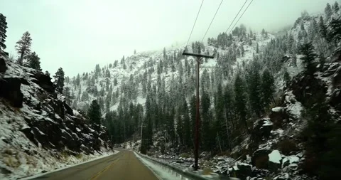 Snowy Idaho canyon viewed from windshield Stock Footage 342689028
