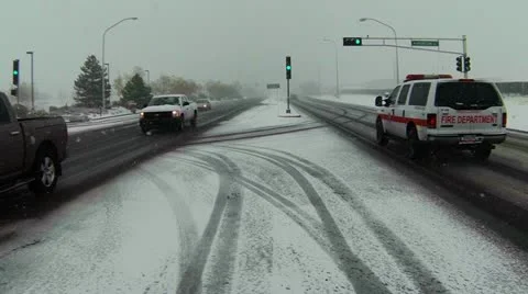 Snowy intersection car pov 48fps Stock Footage 22375615