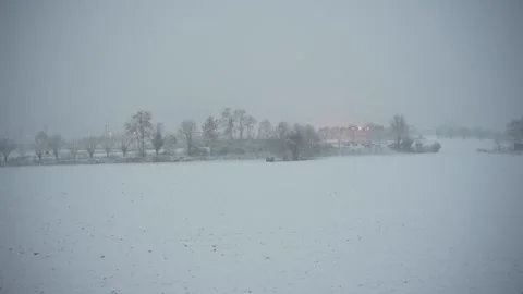 Snowy landscape during snowfall Stock Footage 147496133