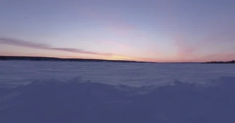 Snowy landscape during sunset Stock Footage 79788655