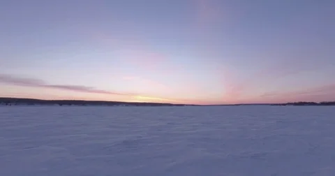 Snowy landscape during sunset Stock Footage 79789082