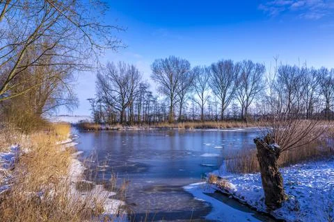 Snowy landscape with hills and meadows in Buytenpark Zoetermeer, the Netherla Stock Photos