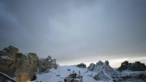 A snowy landscape with a large mountain in the background Stock Footage 292098248