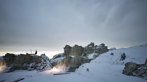 A snowy landscape with a large mountain in the background Stock Footage 292098307