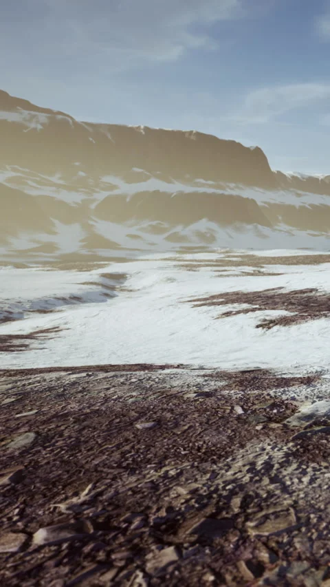 Snowy landscape with mountains under clear sky during daylight hours Stock Footage 346758970