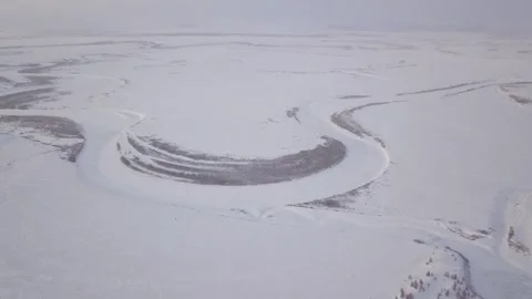 Snowy landscape with a river. Far north white field snowy landscape Stock Footage 269845352