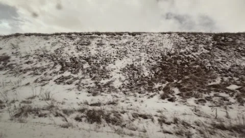 Snowy landscape seen from train window during travel in winter weather Stock Footage 333707336